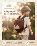 Child wearing the Bruno the Bear backpack outdoors
