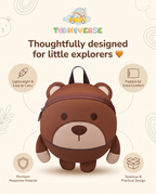 Bruno the Bear backpack open showing interior with lunch box, water bottle, pencil case and toy