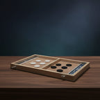 Overhead view of the wooden sling-puck board on a table, white pucks on one lane and black pucks on the other.