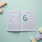 Open book spread showing an apple counting page and a number 6 tracing page with a cartoon dinosaur