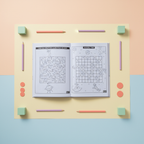 Open spread with an alien maze puzzle and a sudoku grid puzzle, flanked by colored pencils